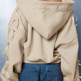 Sudadera con capucha y cremallera con lazo lateral bordado
