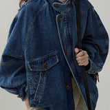 Chaqueta utilitaria en denim lavado con cuello alto
