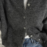 Chaleco vintage de punto gris claro con botones de concha