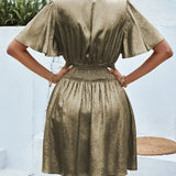 Vestido de mujer - Escote en pico - Mangas mariposa - Cintura ajustada - Tejido brillante