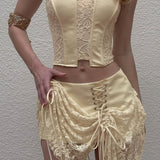 Conjunto elegante de top de tubo de color liso y minifalda de cintura baja