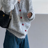 Cárdigan oversize con botones en forma de corazón y cuello redondo