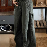 Pantalones cargo de pierna ancha en denim descolorido y desgastado