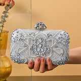Clutch de noche de diseño en cristal y diamantes, adornado con pedrería, para boda o fiesta.