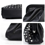 Clutch de diseñador negro con remaches