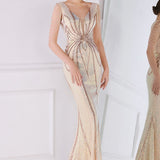 Vestido de noche sirena con lentejuelas y cuentas florales.