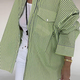 Blusa de rayas con botones y mangas largas