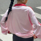 Blusa holgada de manga larga y cuello en V con estampado digital.