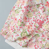 Vestido mini abotonado con cuello Peter Pan y mangas abullonadas florales