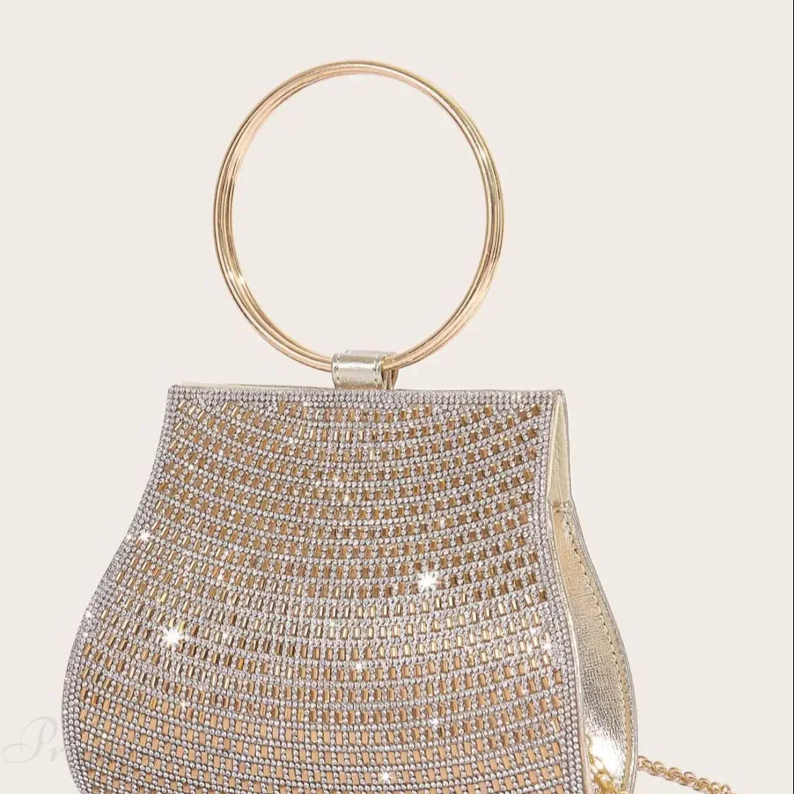 Clutch de noche nupcial adornado con pedrería y diamantes.