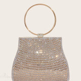 Clutch de noche nupcial adornado con pedrería y diamantes.