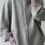 Sudadera con capucha extragrande con cremallera en color rosa descolorido