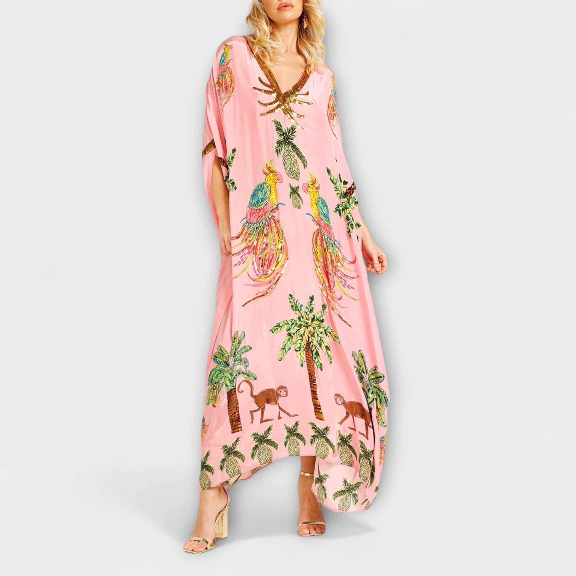 Linda - Impresionante vestido con tirantes asimétricos y estampado de palmeras