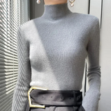 Suéter de mujer – Corte entallado – Punto de lana – Cuello alto – Ribete de canalé