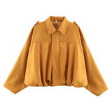 Chaqueta bomber para mujer – Corte oversize – Tejido suave efecto ante – Cuello con muesca