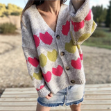 Chaleco de mujer – Tejido de lana – Corte holgado – Cuello en V – Estampado de corazones – Abotonado