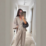 Conjunto de dos piezas para mujer: Top holgado con cuello en V y pantalón ancho de cintura alta.