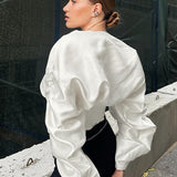 Blusa con cintura deshuesada y mangas anchas y abullonadas