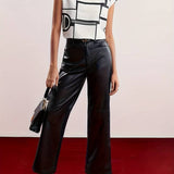 Holli - blusa sin mangas con cuello redondo
