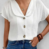 Blusa de mujer – Corte holgado – Textura arrugada – Mangas cortas – Botones llamativos