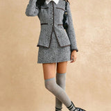 Conjunto de dos piezas: chaqueta y falda de tweed vintage con vueltas en la espalda