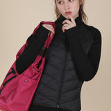 Chaqueta ligera, ajustada y de cuello alto, resistente al viento y deportiva.