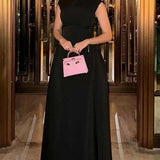 Elegante vestido liso sin mangas con cintura fruncida.