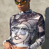 Blusa sexy de manga larga con cuello redondo en malla transparente estampada.