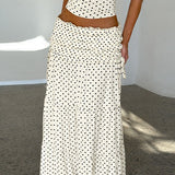 Conjunto de falda larga con bustier de lunares y lazo lateral