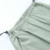 Pantalones cargo holgados con cintura elástica y cordón.
