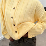 Chaleco de punto acanalado amarillo con cuello redondo