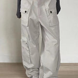 Pantalones cargo de mezclilla retro de tiro bajo con bolsillos