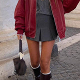 Chaqueta con cremallera de piel sintética con bloques de color