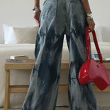 Vaqueros vintage de tiro alto y pierna ancha con efecto tie-dye