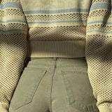 Sudadera con capucha de manga larga con cuello con cremallera y aberturas, rayas con bloques de color.