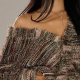 Cárdigan holgado con rayas de colores y cuello en pico