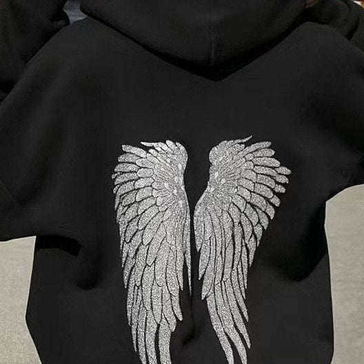 Sudadera informal con estampado de alas y lentejuelas.