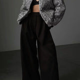 Elegante y lujosa chaqueta de tweed con lentejuelas.