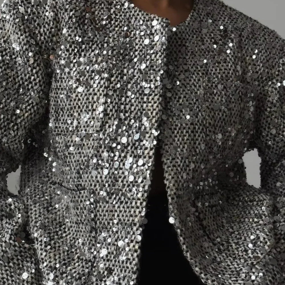 Elegante y lujosa chaqueta de tweed con lentejuelas.