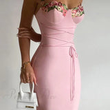 Vestido sin tirantes con bordado floral