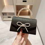 Clutch con cadena y lazo de diamantes estilo europeo y americano