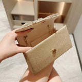 Clutch con cadena y lazo de diamantes estilo europeo y americano