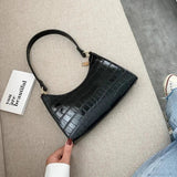 Exquisito bolso de hombro retro de cuero