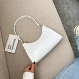 Exquisito bolso de hombro retro de cuero