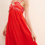 Un precioso y original vestido midi con tirantes y forma de pez.
