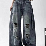 Vaqueros tie-dye rotos de pierna ancha