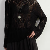 Blusa de punto jacquard con estampado de rombos