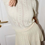 Conjunto de falda y cuello redondo de punto ligero calado en color liso