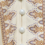 Minivestido étnico elegante con estampado paisley y escote en pico