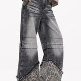 Vaqueros de pierna ancha con parches de leopardo